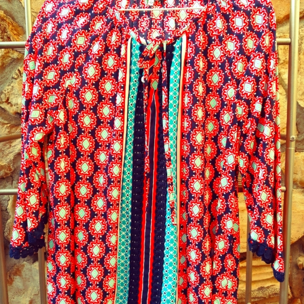Crown and Ivy blouse size 2. This is made of 100% ray on exclusive of decoration